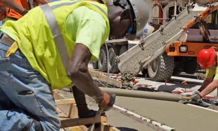 Another 320 feet of track cemented along Streetcar route