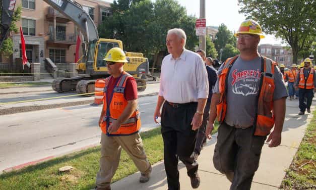 Mayor Barrett walks with Streetcar workers along Milwaukee’s transit future