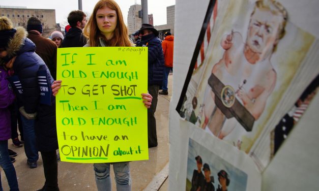 Messages to NRA shown on signs at “March for Our Lives” in Milwaukee