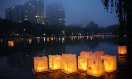 Illuminated wishes floated across a foggy lagoon for first Water Lantern festival