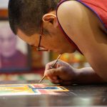 Tibetan monks share culture in colored mandala painted with sand at Milwaukee City Hall