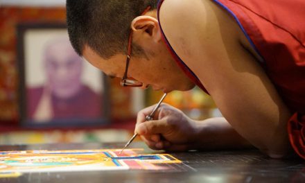 Tibetan monks share culture in colored mandala painted with sand at Milwaukee City Hall