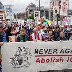Interfaith leaders block access to Milwaukee ICE Office in protest of raids targeting families