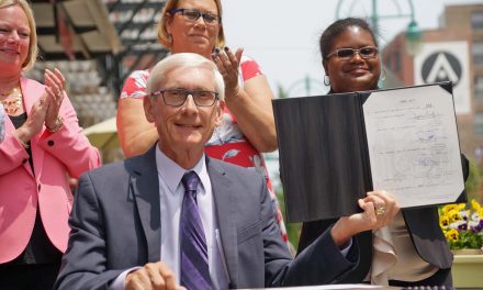 Governor Tony Evers visits Milwaukee to sign law expanding electric transportation options