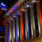 We Need Each Other: Downtown Milwaukee buildings illuminate the darkness with beacons of hope