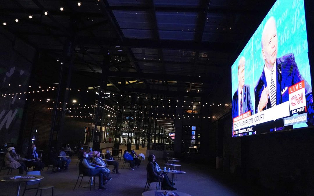 A hot mess inside a dumpster fire: Milwaukee’s Democratic supporters watch first presidential debate