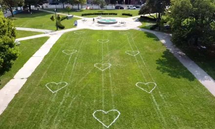 Painted hearts encourage residents to enjoy downtown parks while remaining socially distant