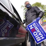 Milwaukee’s Latino voters pick up Biden-Harris yard signs to declare their election day support