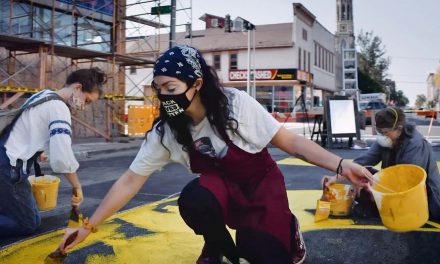 Voting is Power: Milwaukee’s Latinx community installs “Black and Brown Lives Matter” Street Mural