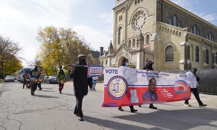 Community stakeholders hold voting rallies to “Light Up” Milwaukee and cause “Good Trouble”