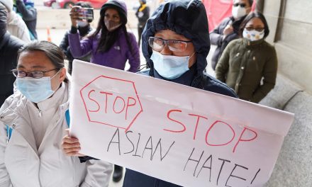 Milwaukee residents hold vigil by City Hall to demand an end of the violence targeting Asian Americans