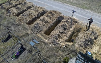 Volunteers in Kyiv endure burdens of exhuming bodies to help investigate war crimes by Russian troops