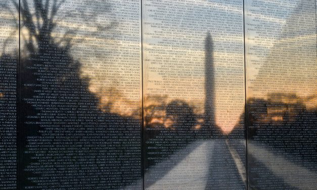 Wall of Faces: Photo found for each service member with name inscribed on the Vietnam Veterans Memorial