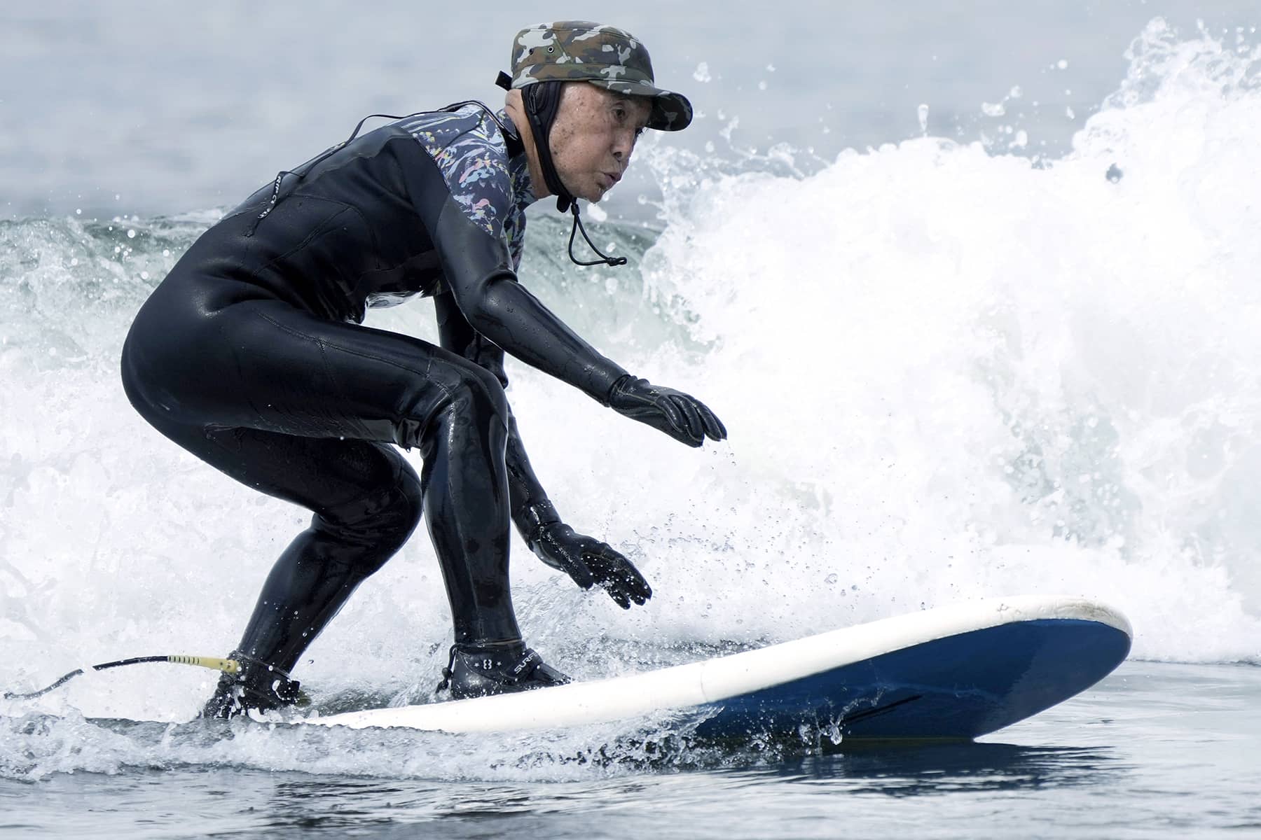 Surfing is life: Senior Japanese surfer inspires Fujisawa's surf culture by  catching waves at 90