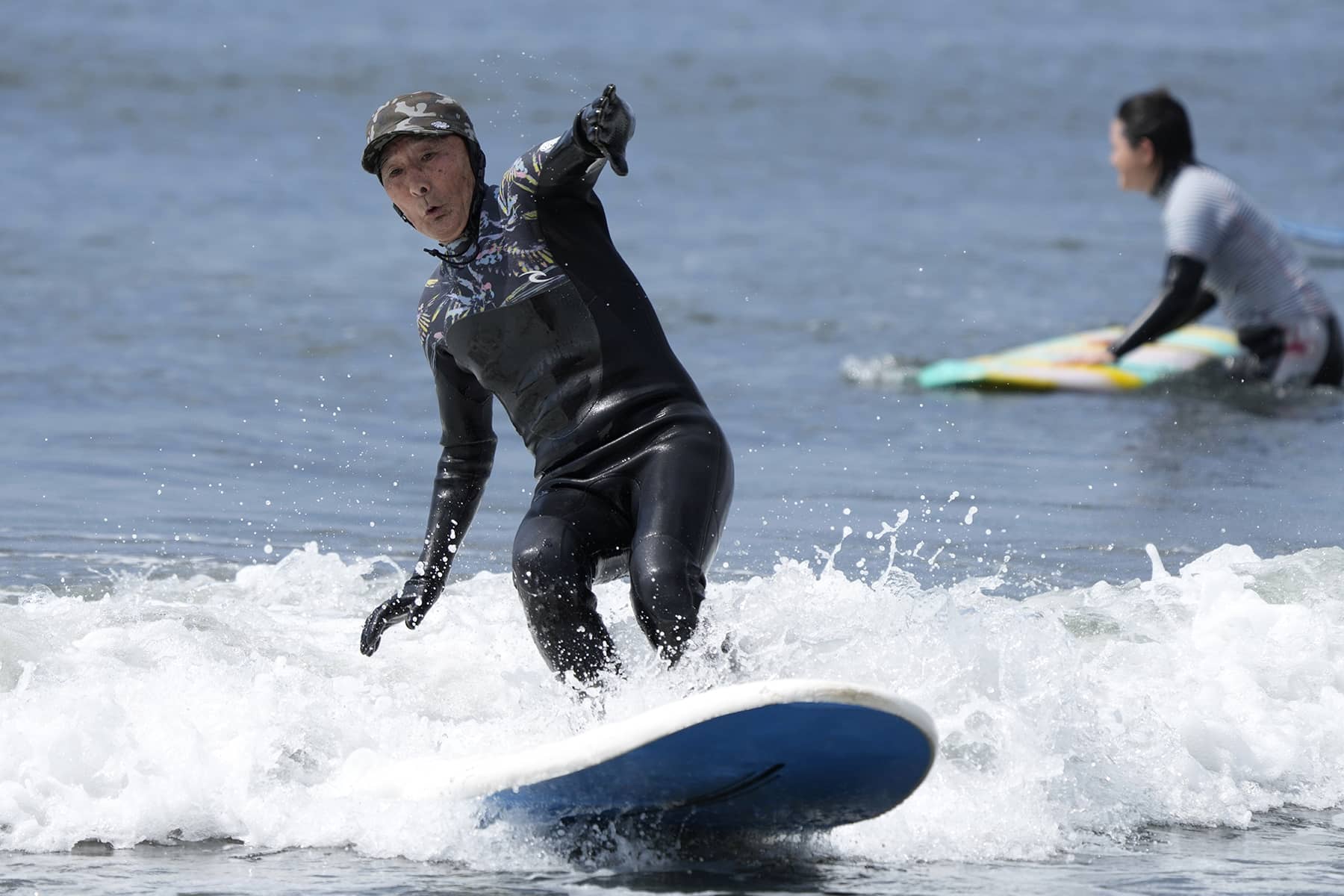 Surfing is life: Senior Japanese surfer inspires Fujisawa's surf culture by  catching waves at 90