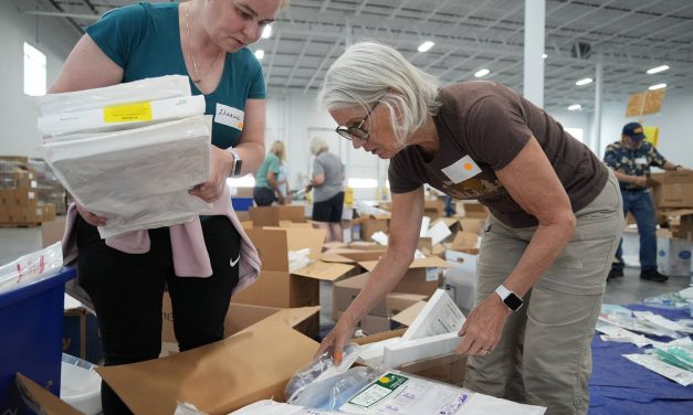 Wisconsin volunteers sort and pack donated medical supplies for use in Ukraine’s hospitals