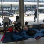 Hundreds of asylum-seekers remain stuck in limbo at Chicago airports while waiting for shelter space