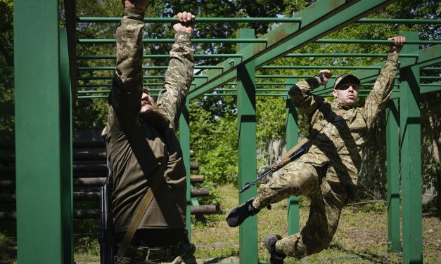 Russia’s brutal advances strain Ukrainian front-line troops just as mobilization law comes into force