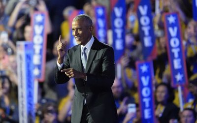 Obamas tag team delivery of inspiring praise for Harris and dire warnings about Trump on DNC’s second night