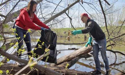 Photo Essay: Volunteers remove floating trash from local rivers