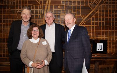 Norquist and Grunau among RiverWalk leaders celebrating the district’s top global award
