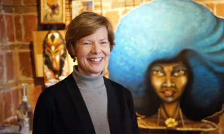Senator Tammy Baldwin celebrates Sherman Phoenix’s success during visit with business owners