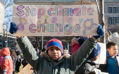 Milwaukee students risk arrest during climate protest against banks funding fossil fuel industry
