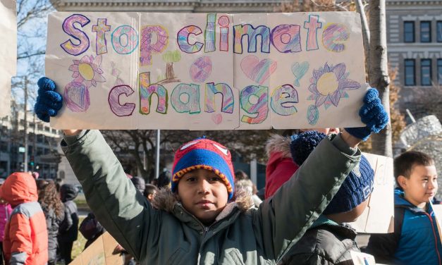 Milwaukee students risk arrest during climate protest against banks funding fossil fuel industry