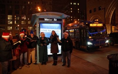 MCTS “elves” surprise riders with holiday cheer at bus stops around Milwaukee