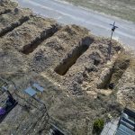 Volunteers in Kyiv endure burdens of exhuming bodies to help investigate war crimes by Russian troops