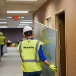 Komatsu partners with Habitat ReStore to salvage reusable items from historic National Avenue Campus