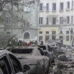 Russian cruise missile attack kills residents far from front lines in Western Ukraine city of Lviv