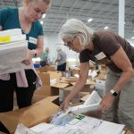 Wisconsin volunteers sort and pack donated medical supplies for use in Ukraine’s hospitals