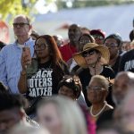 Hundreds of people deride Governor Desantis during address at vigil mourning racist killings in Florida