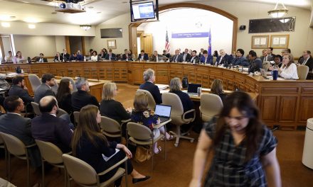 Governor Evers signs Wisconsin budget he brokered in a forced compromise with state Republicans